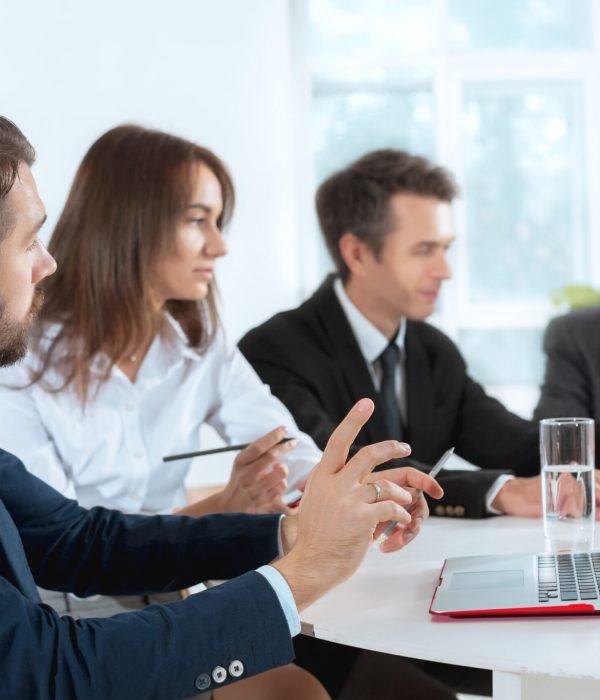 The business people working together at table. The meeting or summit concept